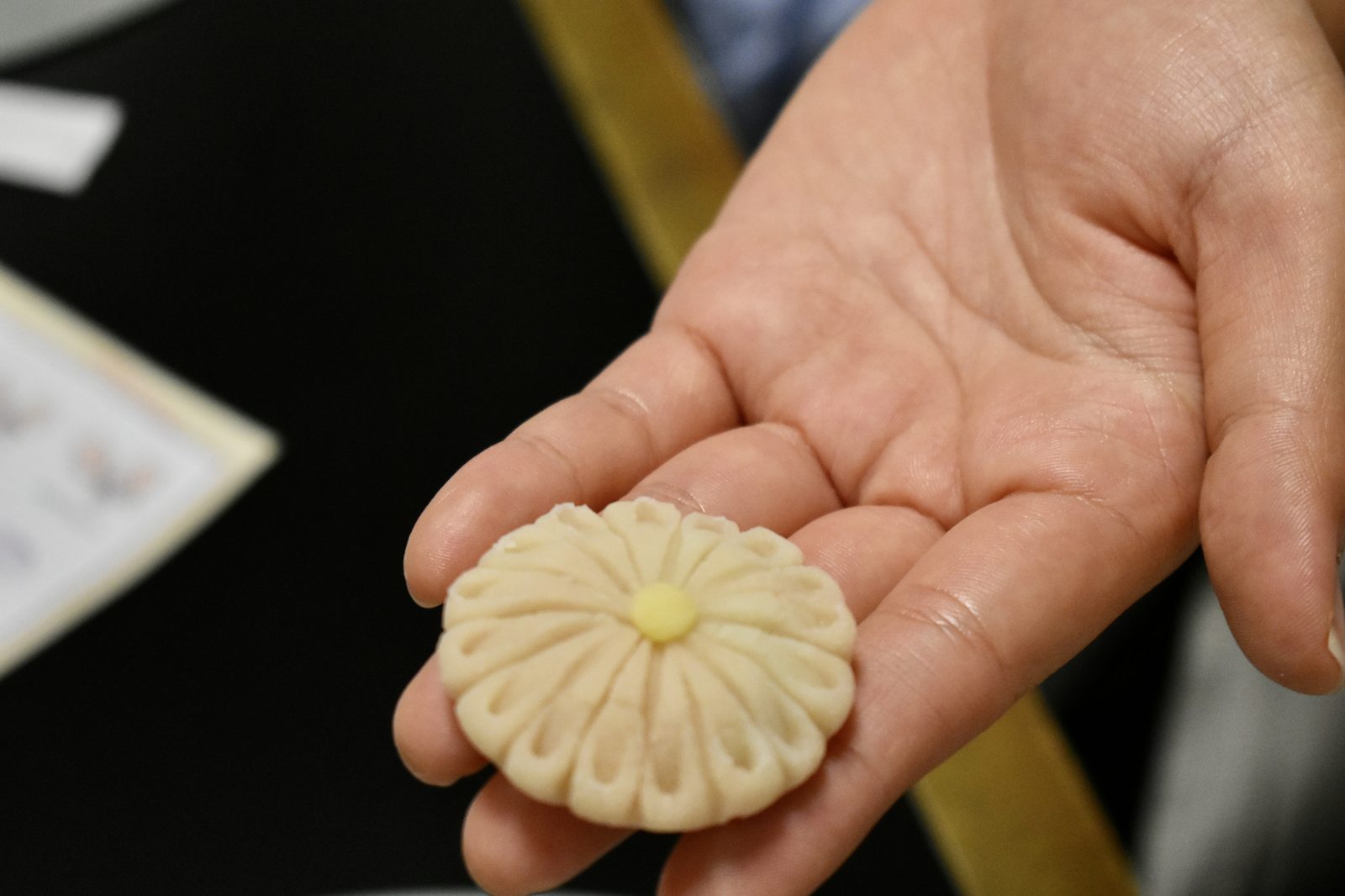 Finished wagashi sweet held in hand