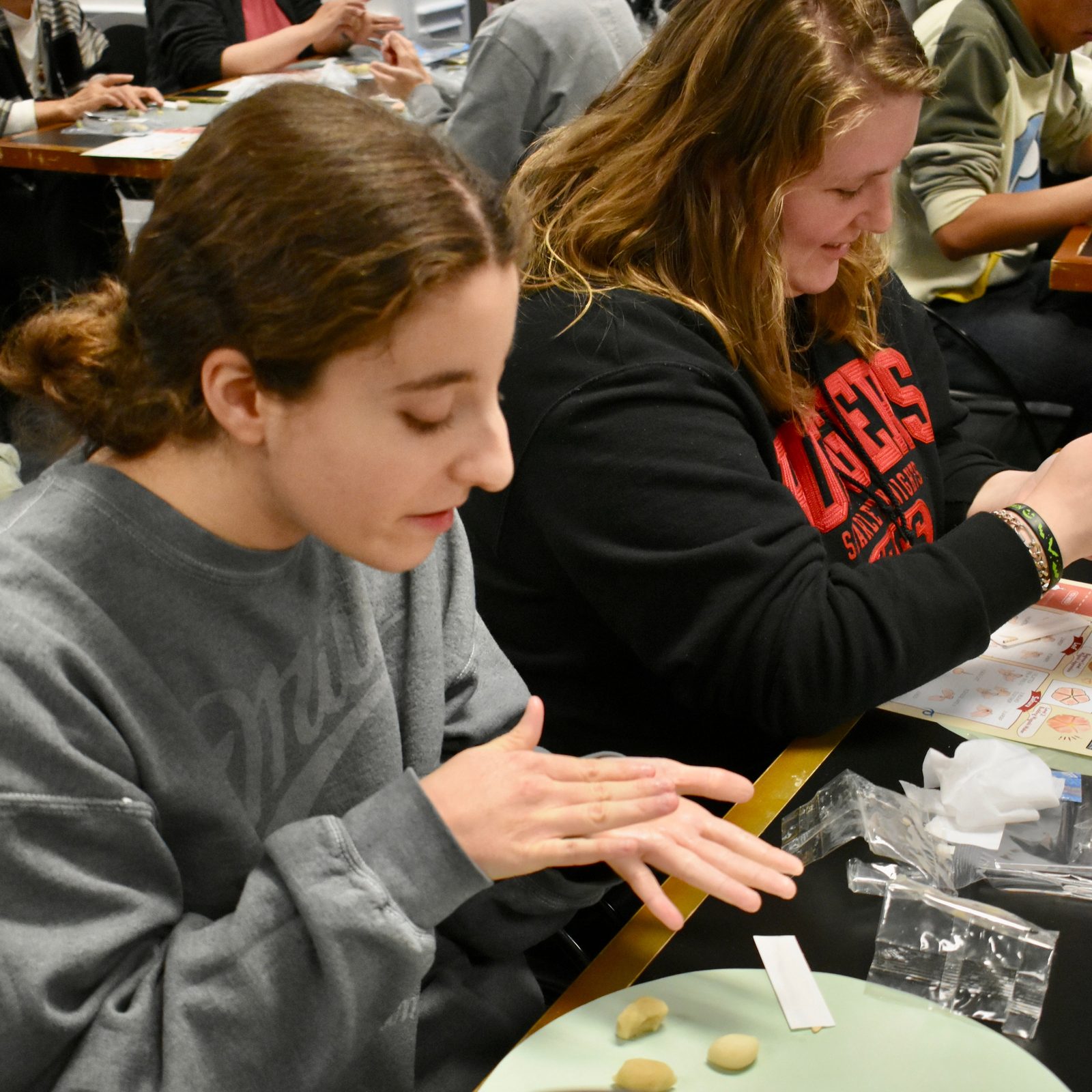 Workshop participants shaping wagashi